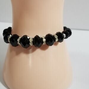 Stretch graduated black bead and rondelle bracelet